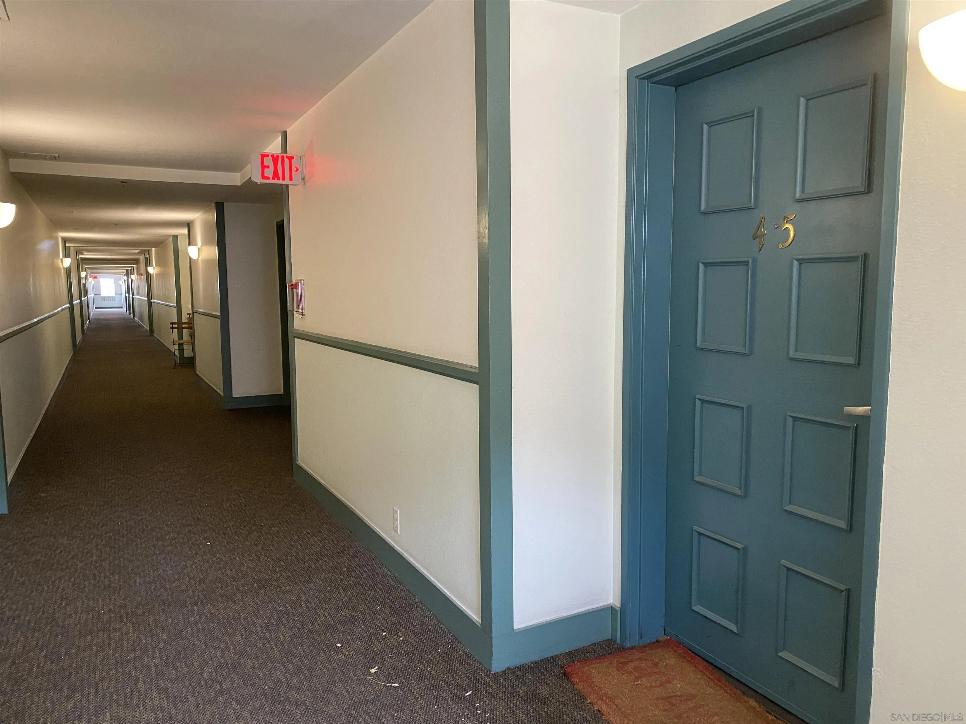 3955 Faircross Place, Unit 45 San Diego, CA 92115 - Photo 12 of 14 a view of a hallway with a elevator