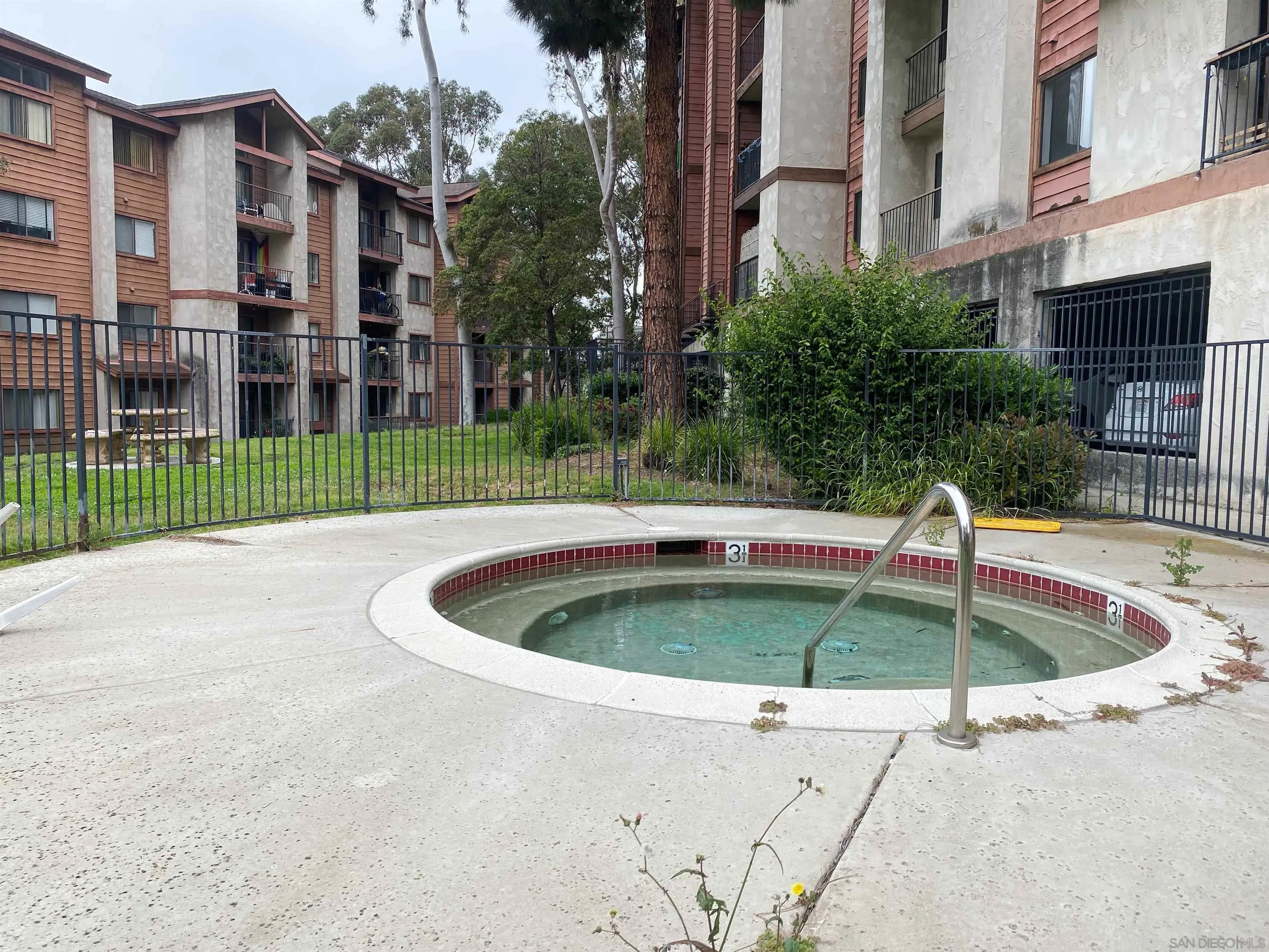 3955 Faircross Place, Unit 45 San Diego, CA 92115 - Photo 14 of 14 a view of a fountain in front of a building