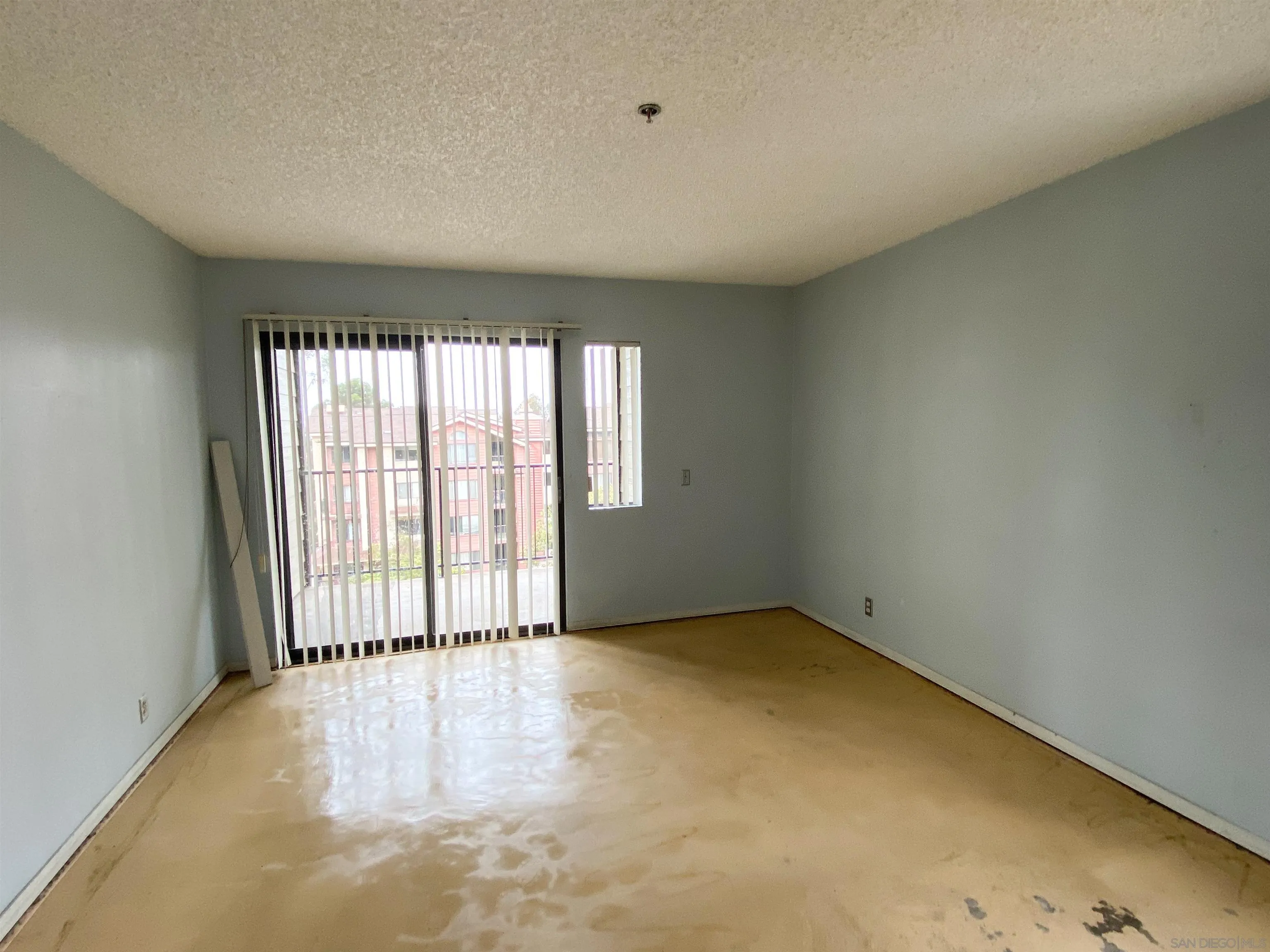 3955 Faircross Place, Unit 45 San Diego, CA 92115 - Photo 3 of 14 an empty room with a window