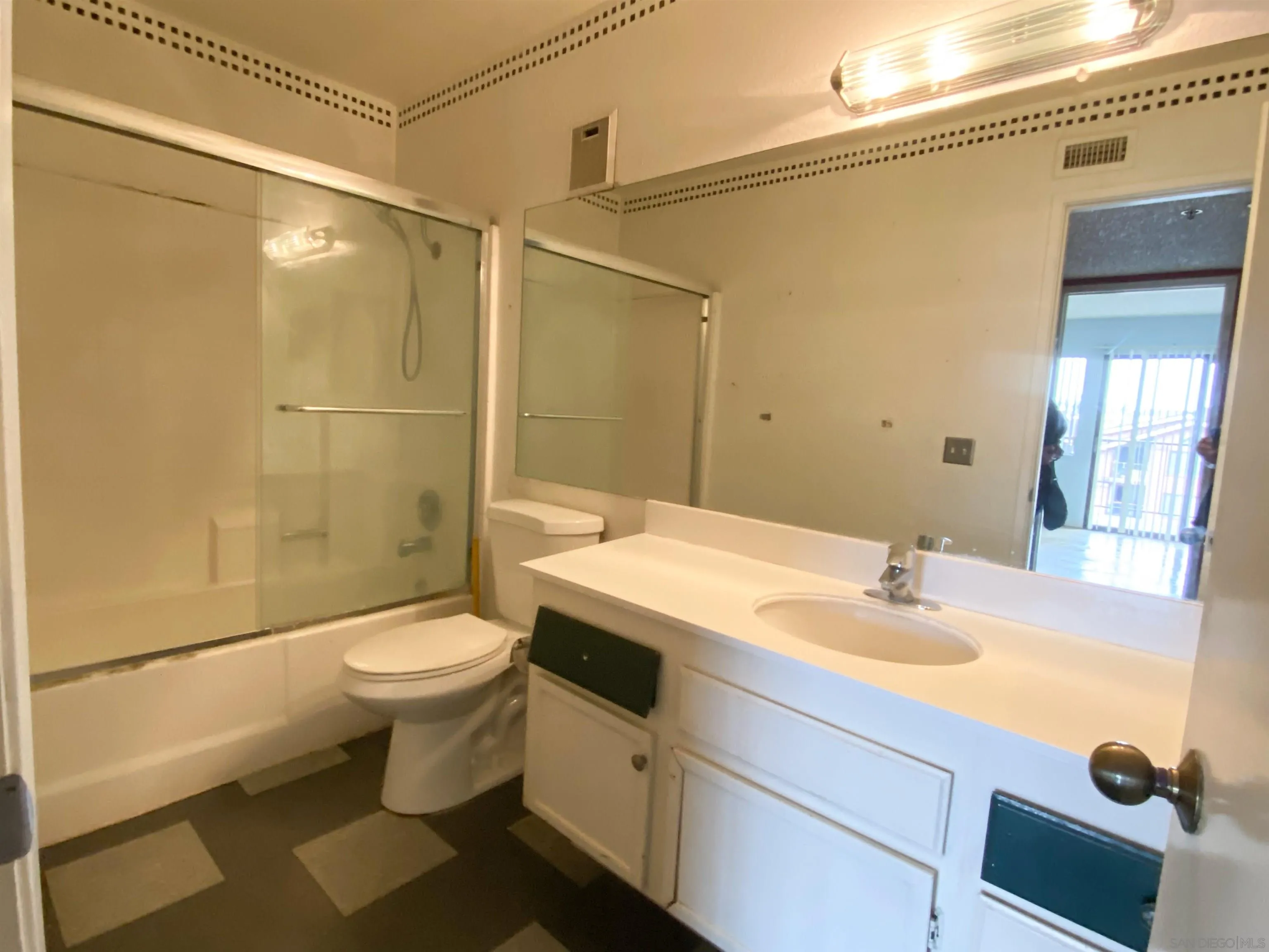 3955 Faircross Place, Unit 45 San Diego, CA 92115 - Photo 6 of 14 a bathroom with a sink and a mirror