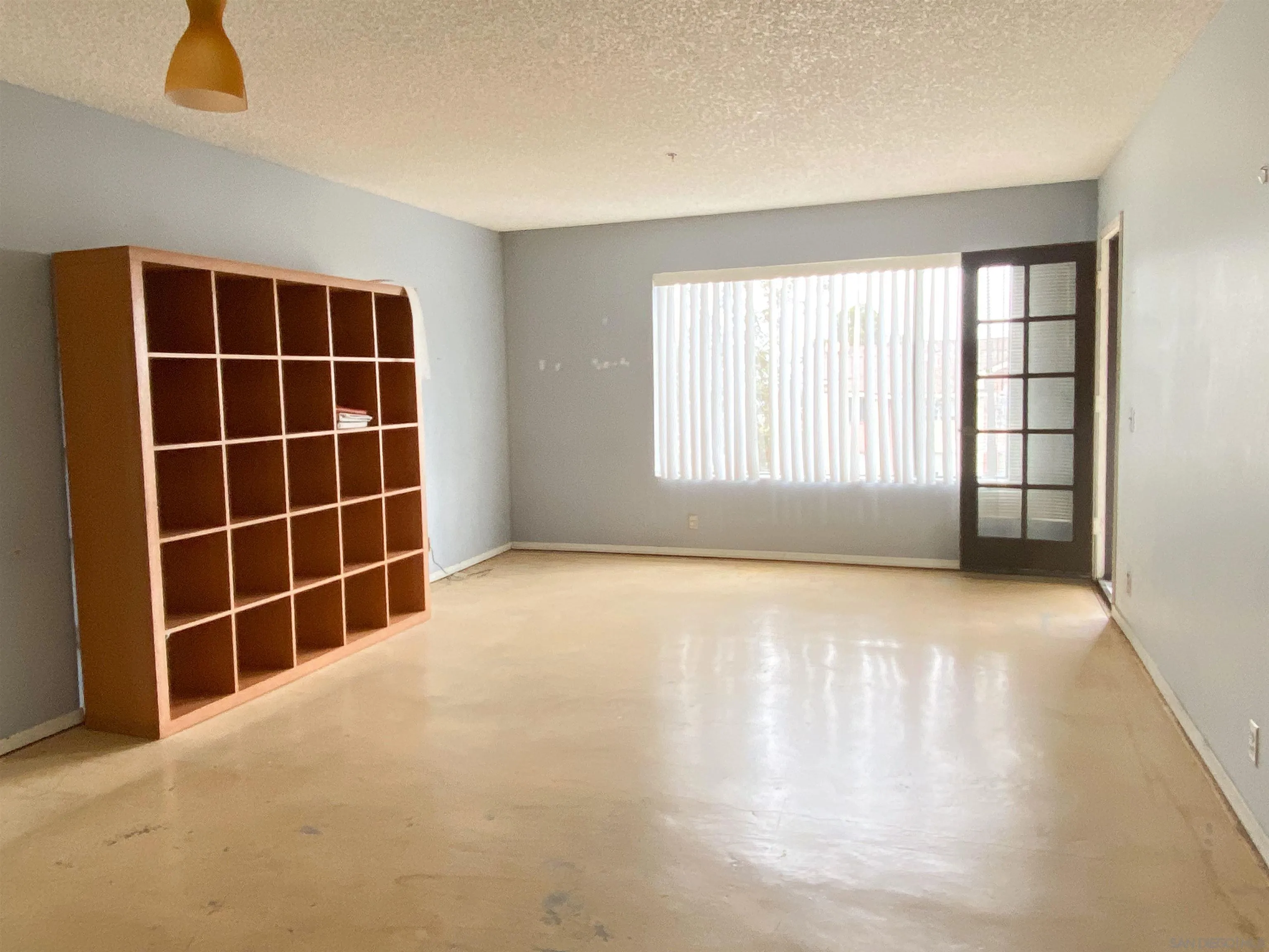 3955 Faircross Place, Unit 45 San Diego, CA 92115 - Photo 8 of 14 a view of empty room with windows