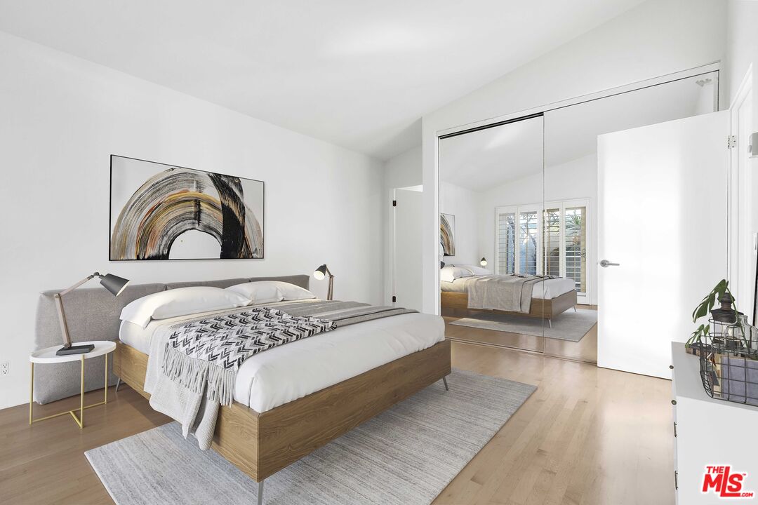 6801 Seawatch Lane Malibu, CA 90265 - Photo 18 of 28 a bedroom with a large bed and a couch