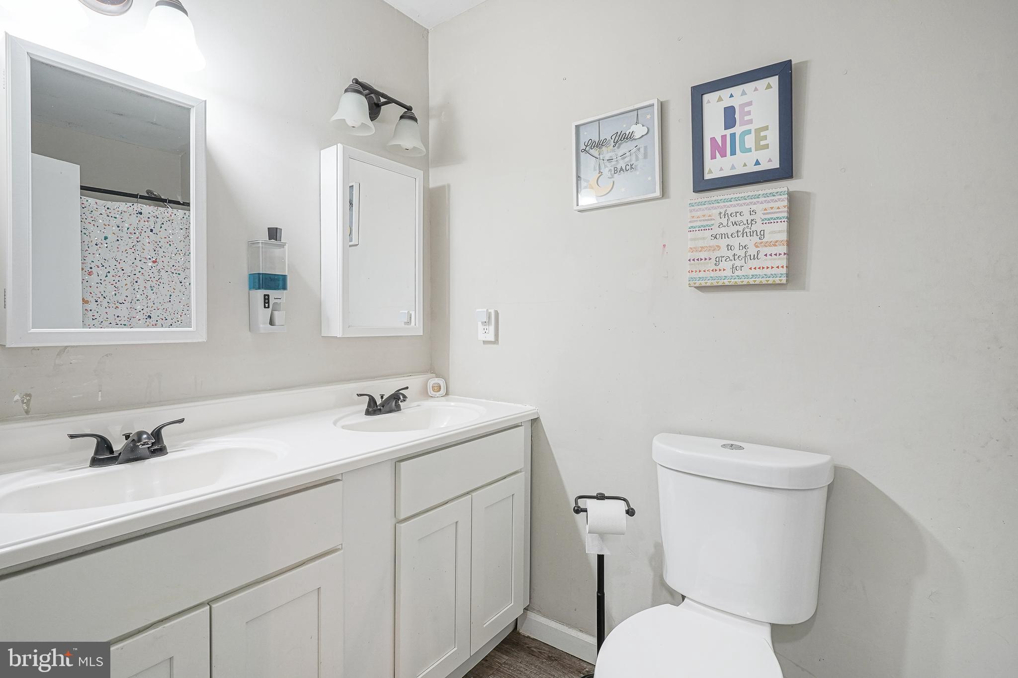 47 Bryant Road Blackwood, NJ 08012 - Photo 8 of 21 a bathroom with a toilet sink and mirror