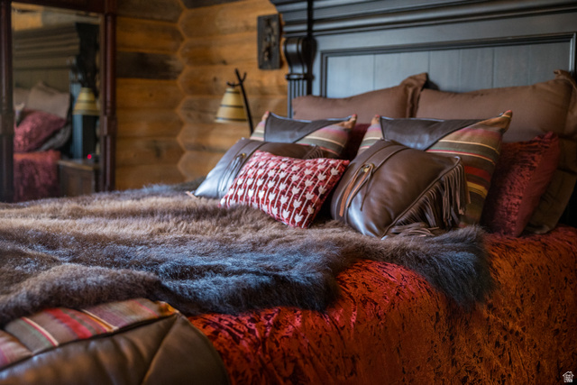18906 North Canyon Road Whiterocks, UT 84085 - Photo 22 of 65 Bedroom featuring rustic walls