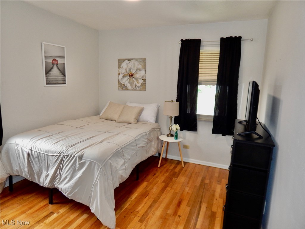 5961 Broadview Road Parma, OH 44134 - Photo 13 of 34 Bedroom 2 on main level featuring light hardwood flooring