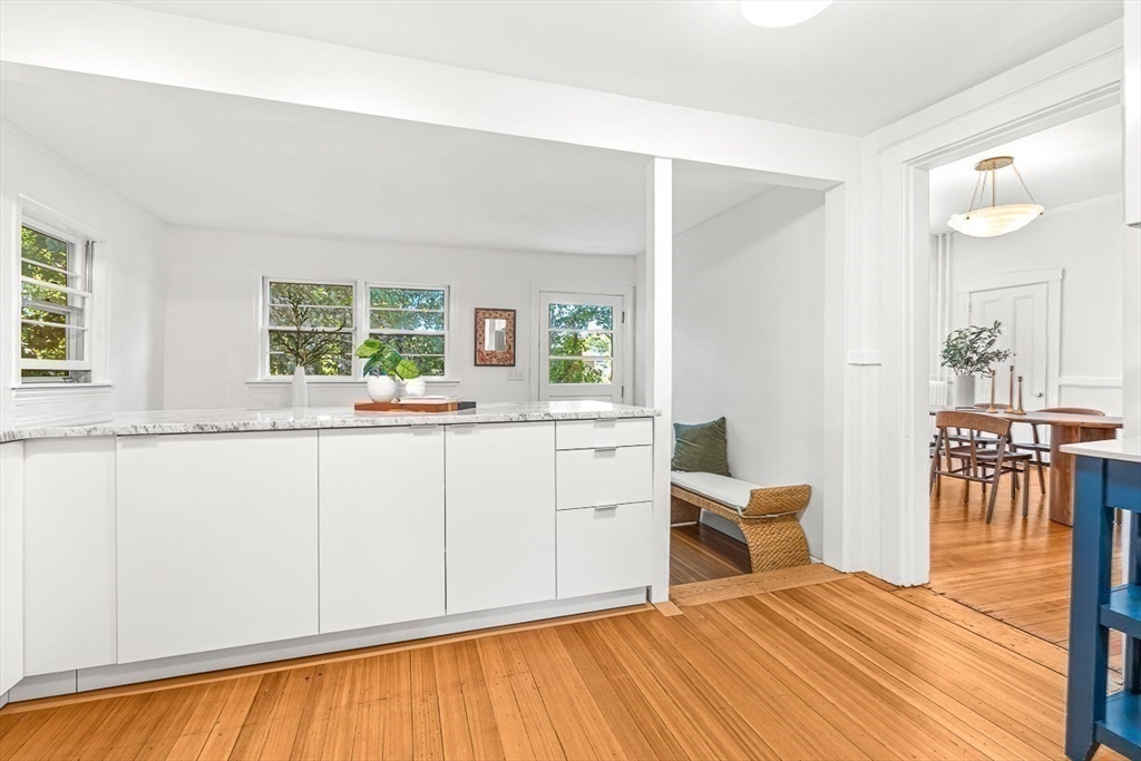25 Sawin Street Natick, MA 01760 - Photo 12 of 19 a bedroom with a bed and large windows