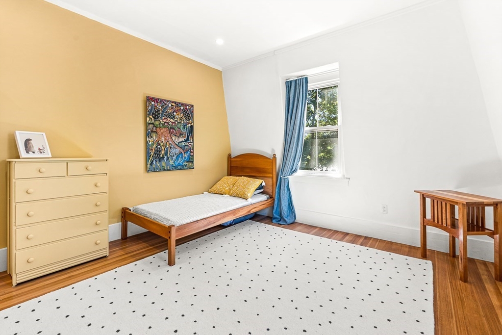 25 Sawin Street Natick, MA 01760 - Photo 17 of 19 a bedroom with a bed and a window