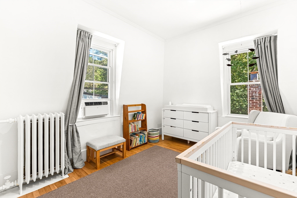 25 Sawin Street Natick, MA 01760 - Photo 19 of 19 a view of a bedroom with furniture and a window