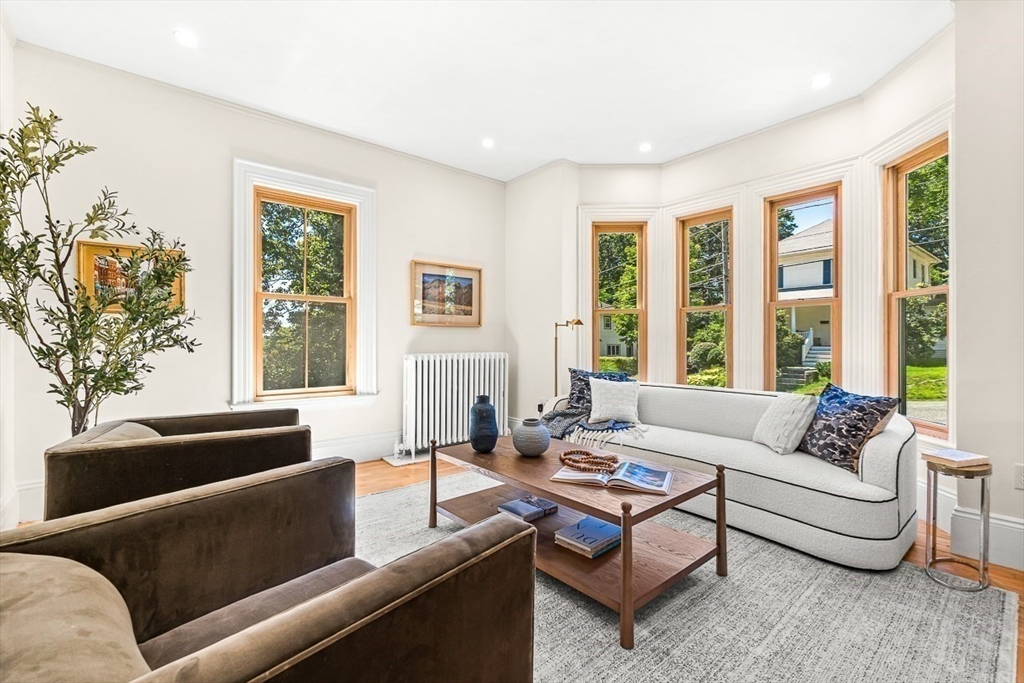 25 Sawin Street Natick, MA 01760 - Photo 4 of 19 a living room with furniture and a large window