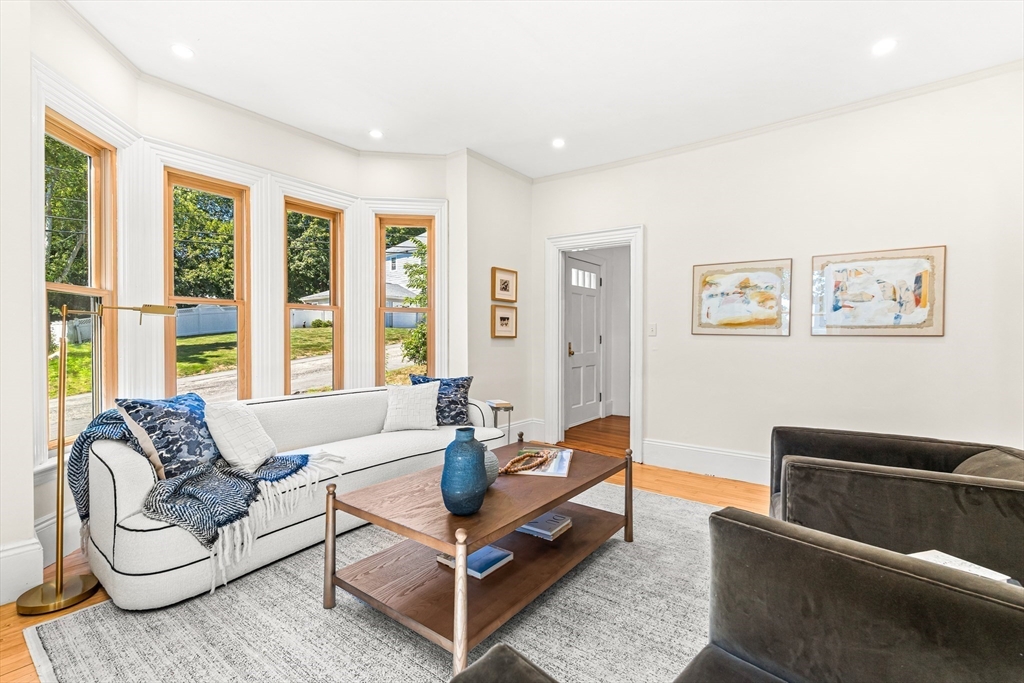 25 Sawin Street Natick, MA 01760 - Photo 5 of 19 a living room with furniture and a large window