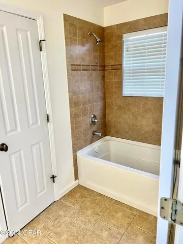 a bathroom with a bathtub
