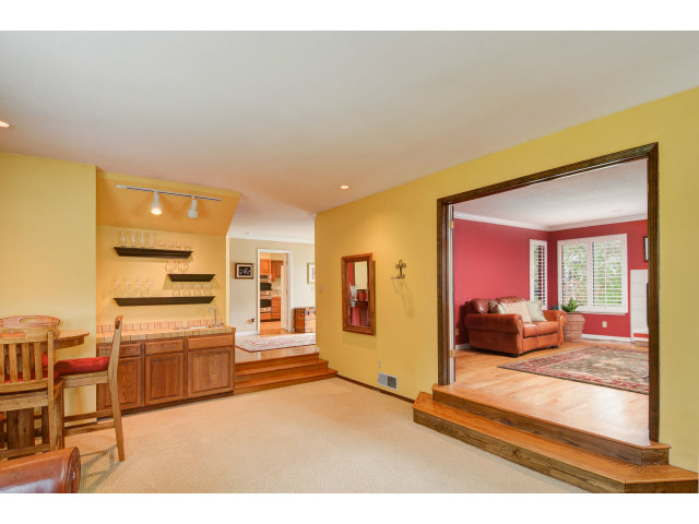 3075 El Toro Road Pebble Beach, CA 93953 - Photo 2 of 25 a living room with furniture and a kitchen view