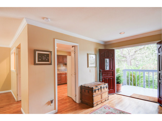 3075 El Toro Road Pebble Beach, CA 93953 - Photo 8 of 25 a living room with furniture and a large window