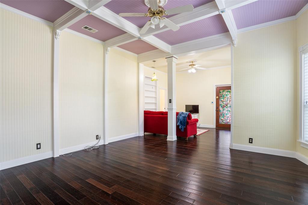 5824 Boone Street Sachse, TX 75048 - Photo 7 of 40 an empty room with wooden floor and windows
