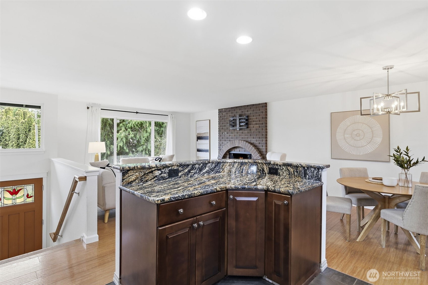 927 217th Street Southwest Bothell, WA 98021 - Photo 12 of 33 a open kitchen with stainless steel appliances granite countertop a stove a sink and a refrigerator