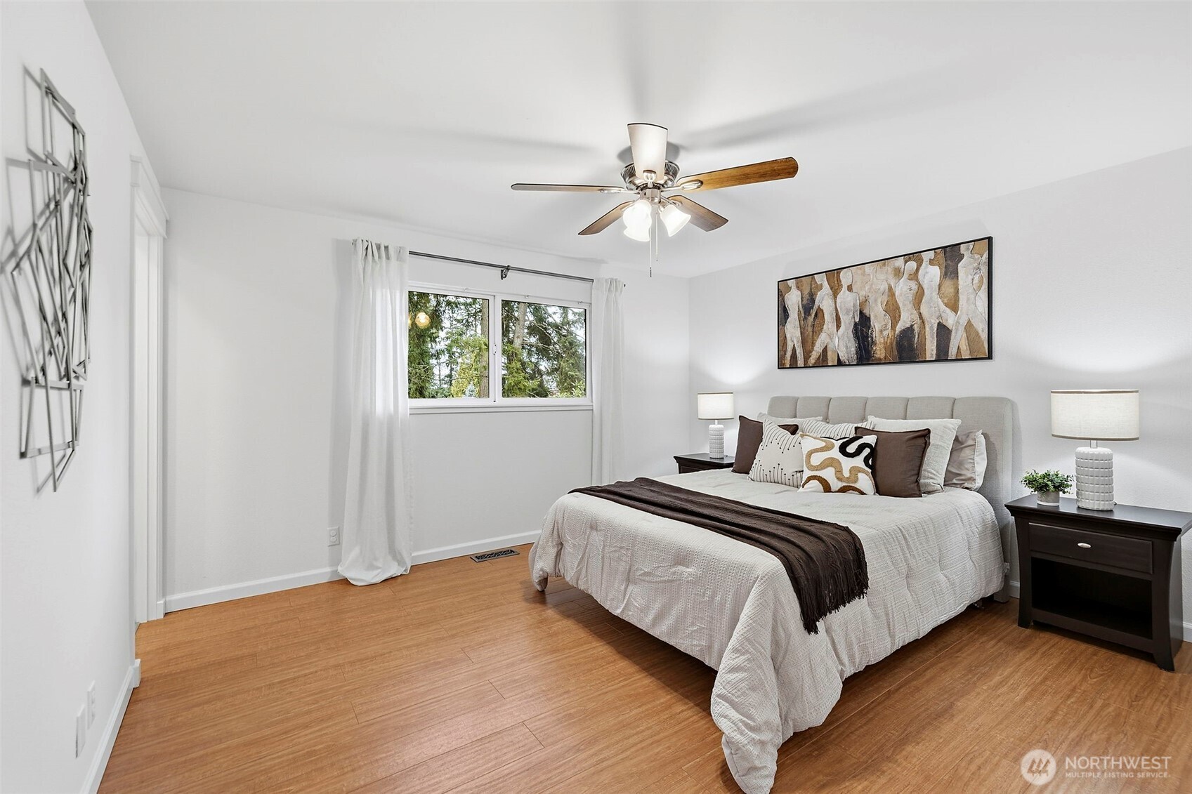 927 217th Street Southwest Bothell, WA 98021 - Photo 16 of 33 a bedroom with a bed and a window