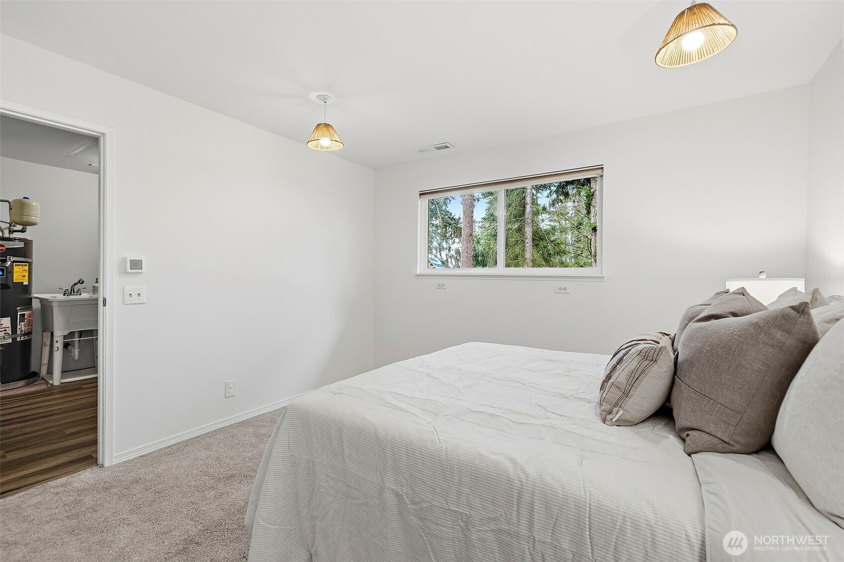 927 217th Street Southwest Bothell, WA 98021 - Photo 27 of 33 a bedroom with a bed and a window