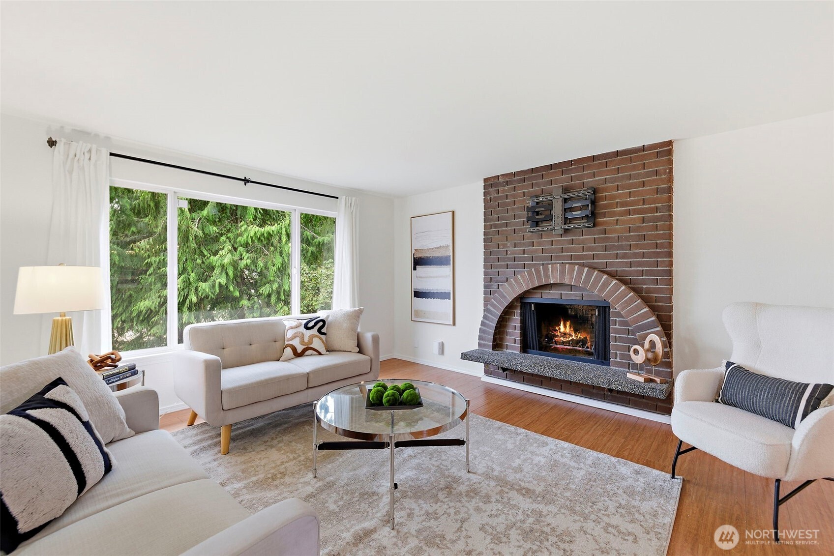 927 217th Street Southwest Bothell, WA 98021 - Photo 3 of 33 a living room with furniture and a fireplace