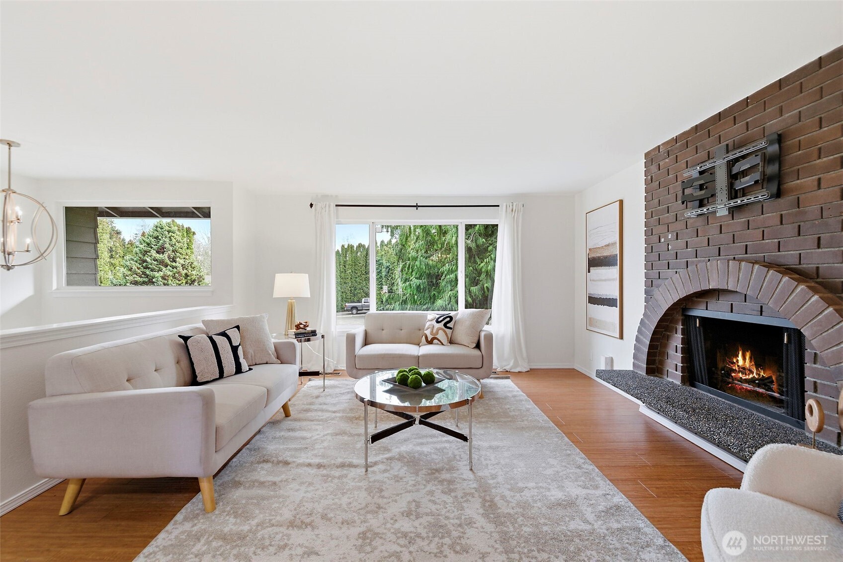 927 217th Street Southwest Bothell, WA 98021 - Photo 4 of 33 a living room with furniture and a fireplace