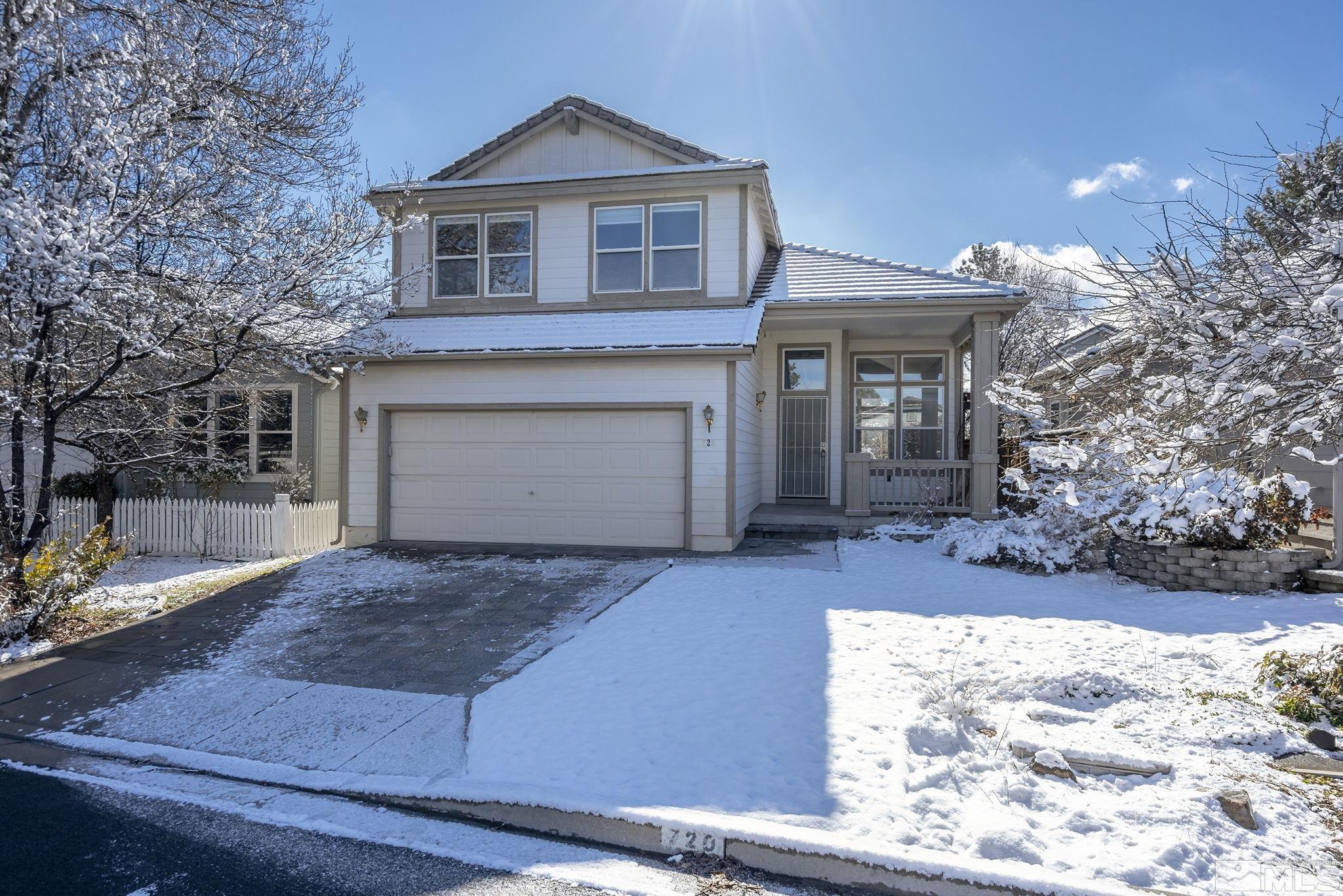 720 Caughlin Glen Reno, NV 89519 - Photo 1 of 24 a front view of a house with a yard