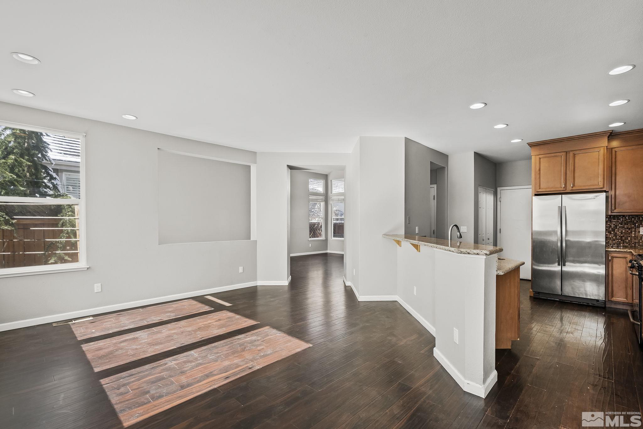 720 Caughlin Glen Reno, NV 89519 - Photo 10 of 24 a view of a kitchen cabinets and wooden floor