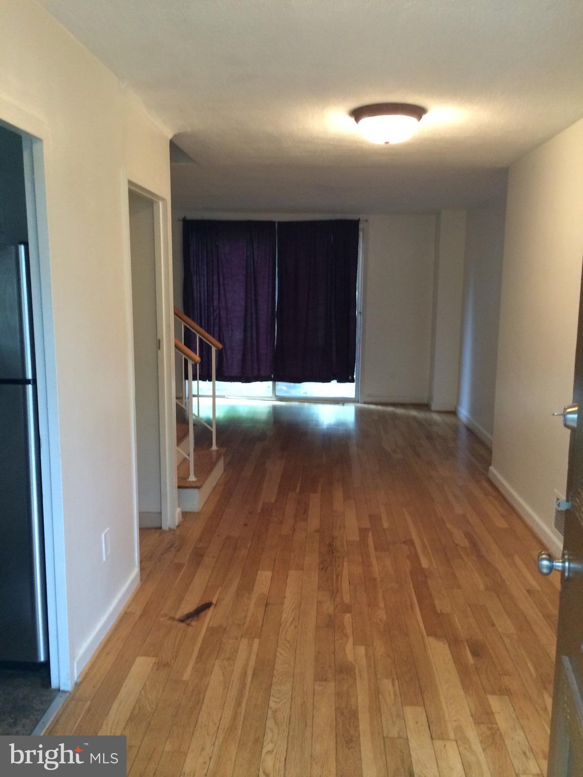 803 3rd Street Southwest, Unit 706 Washington, DC 20024 - Photo 3 of 18 a view of a room with wooden floor