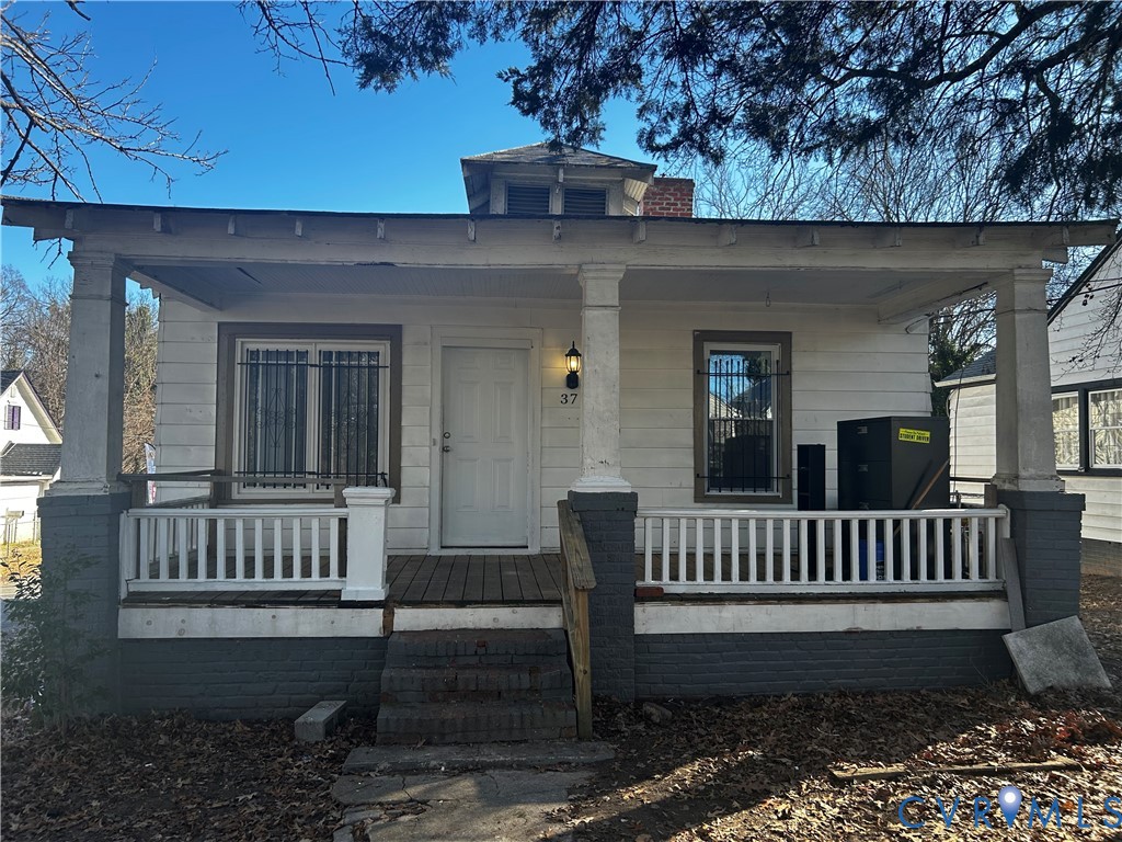 View of front of house featuring a full porch