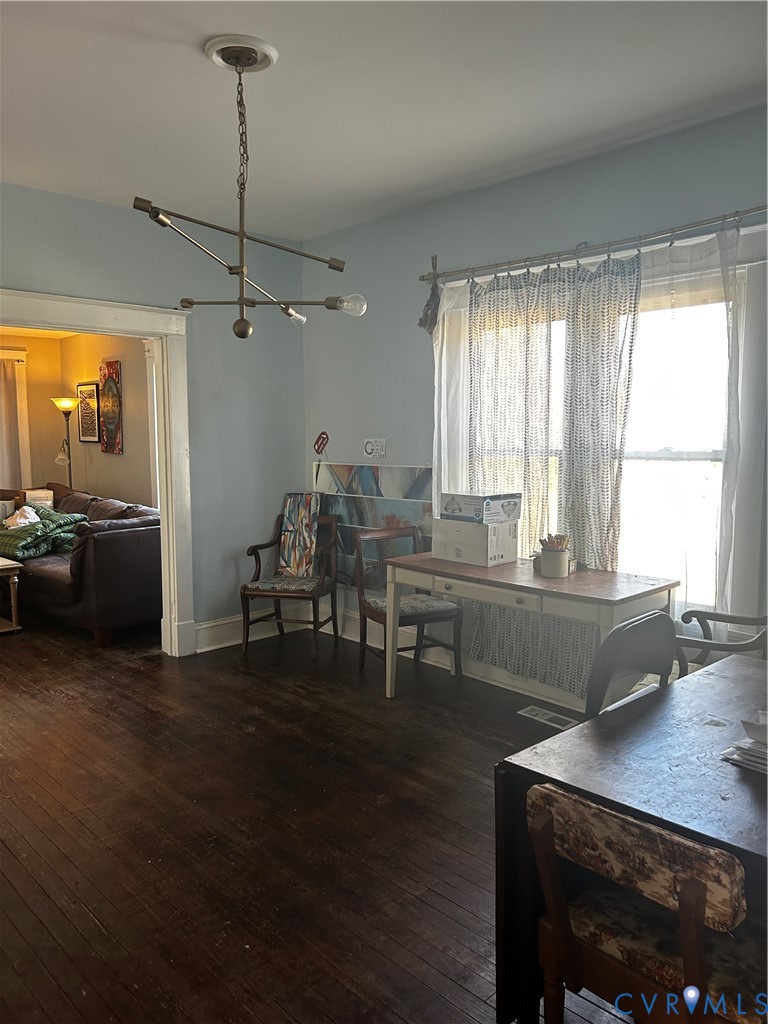 3703 Decatur Street Richmond, VA 23224 - Photo 6 of 14 Dining space featuring dark wood flooring and a ch