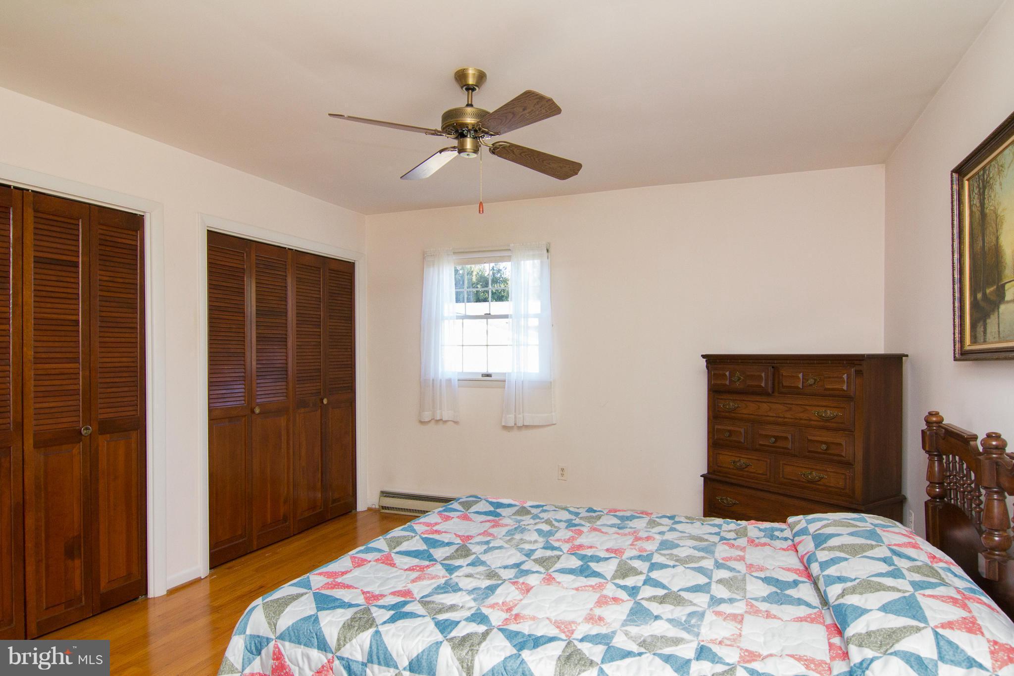 2514 Neudecker Road Westminster, MD 21157 - Photo 11 of 30 a bedroom with a bed and a dresser