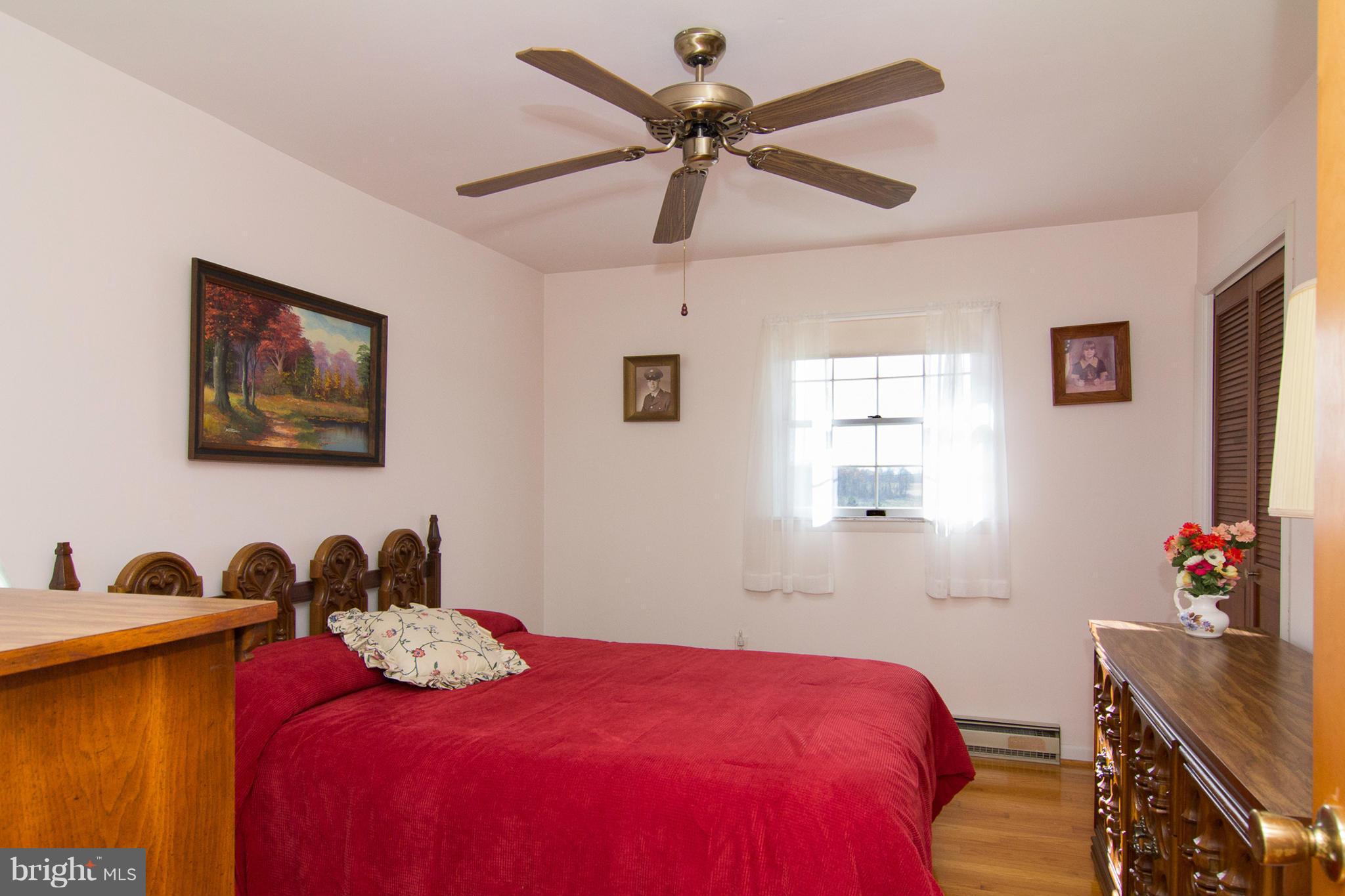 2514 Neudecker Road Westminster, MD 21157 - Photo 14 of 30 a bedroom with bed and a window