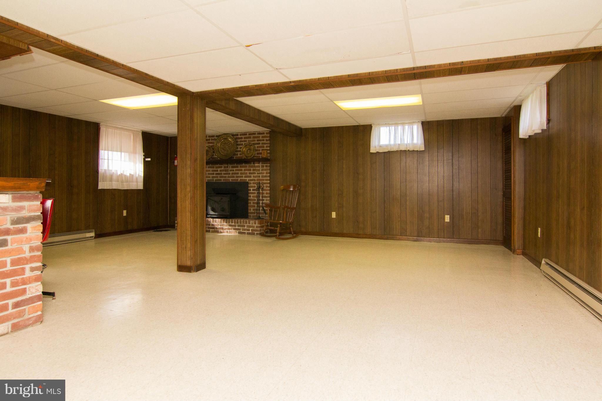 2514 Neudecker Road Westminster, MD 21157 - Photo 16 of 30 a view of an empty room with a fireplace