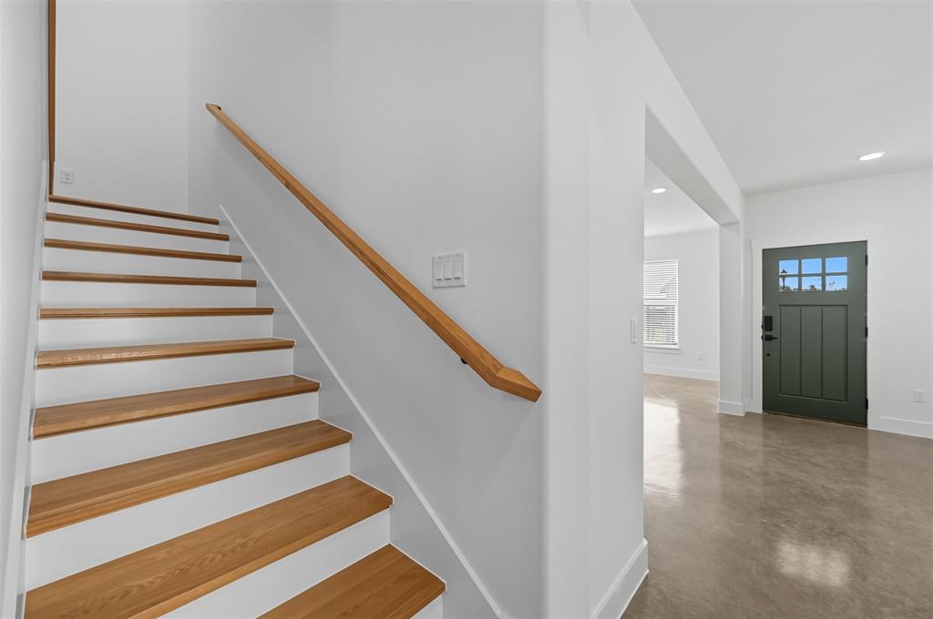 100 Cardinal Wds Granbury, TX 76049 - Photo 16 of 36 Stairway with concrete floors and recessed lighting