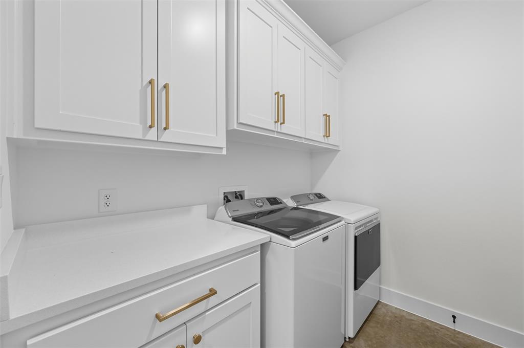 100 Cardinal Wds Granbury, TX 76049 - Photo 30 of 36 Washroom with washing machine and dryer and cabinet space