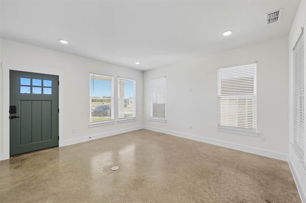 100 Cardinal Wds Granbury, TX 76049 - Photo 4 of 36 Foyer with healthy amount of natural light, recessed lighting, and finished concrete flooring