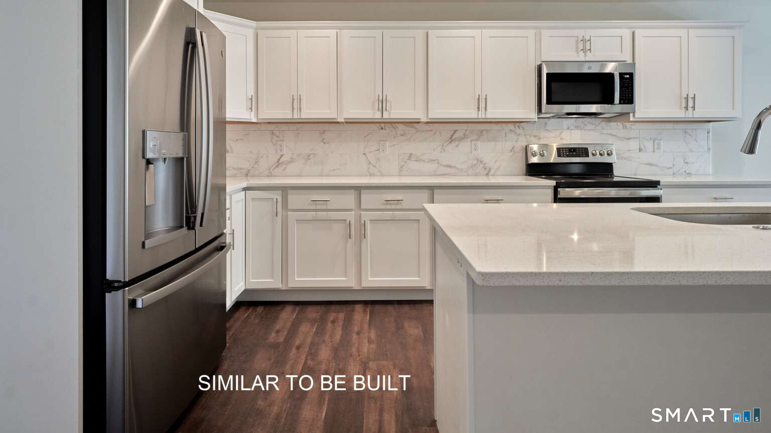 16 Jordan Lane Colchester, CT 06415 - Photo 5 of 19 a kitchen with stainless steel appliances granite countertop a refrigerator sink and stove