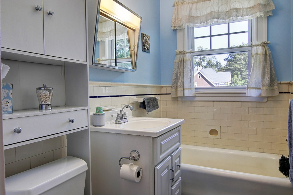 60-62 Meadow Road Woonsocket, RI 02895 - Photo 16 of 25 a bathroom with a sink and a bathtub