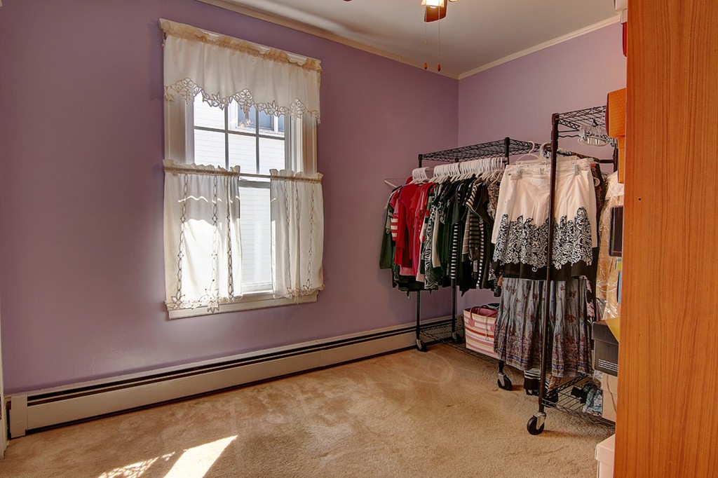 60-62 Meadow Road Woonsocket, RI 02895 - Photo 17 of 25 a view of walk in closet with clothes and shoes