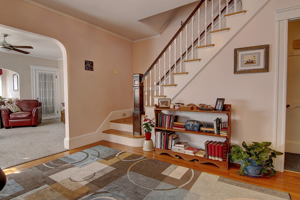 60-62 Meadow Road Woonsocket, RI 02895 - Photo 8 of 25 a view of hall way with furniture and staircase