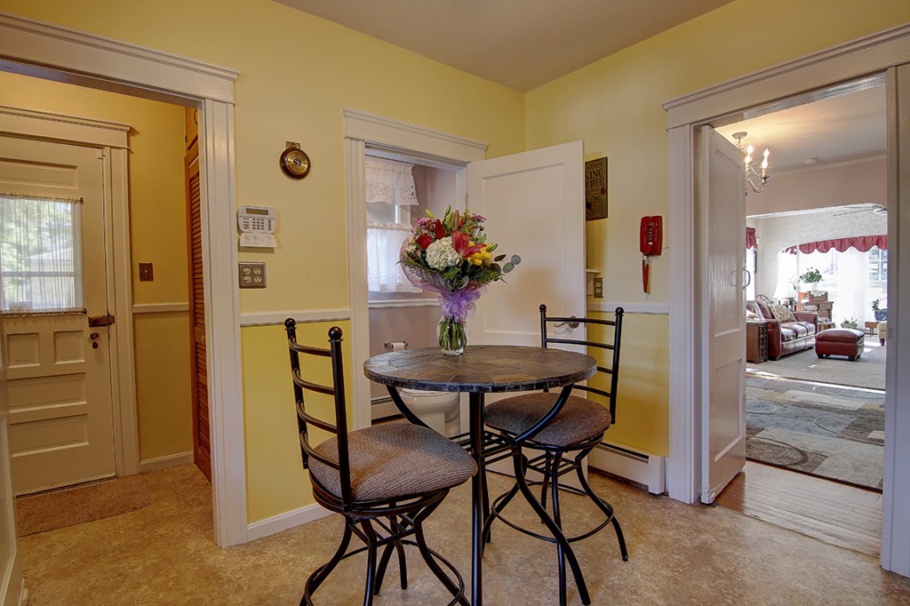 60-62 Meadow Road Woonsocket, RI 02895 - Photo 10 of 25 a view of a dining room with furniture and wooden floor