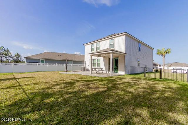 a view of room with window and stairs