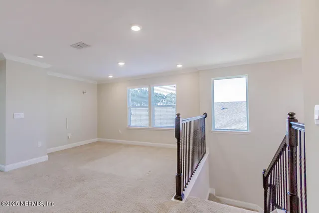 a view of entryway with stairs