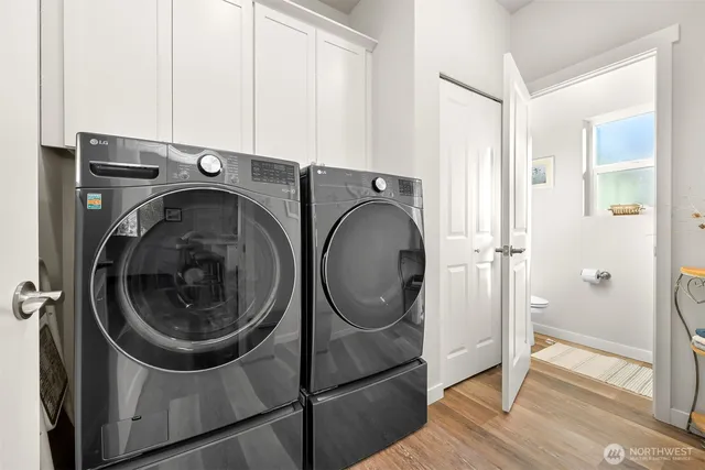 a utility room with dryer and washer
