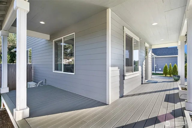 a view of livingroom with furniture and floor to ceiling window