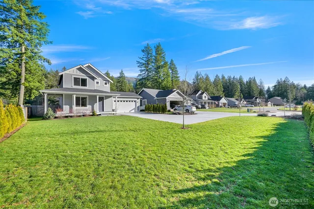 a house with garden in front of it