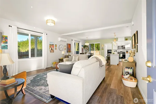 a living room with furniture and a table