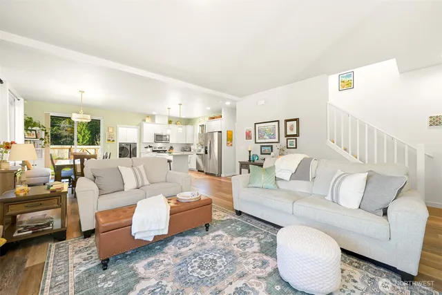 a living room with furniture and a table