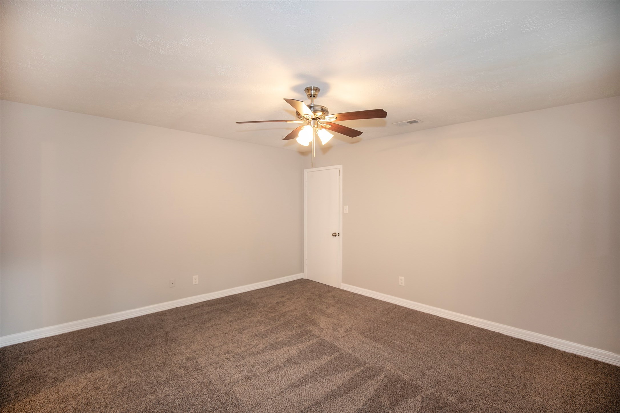 802 Wavecrest Lane Houston, TX 77062 - Photo 16 of 32 The primary bedroom has plenty of space for king size furniture.
