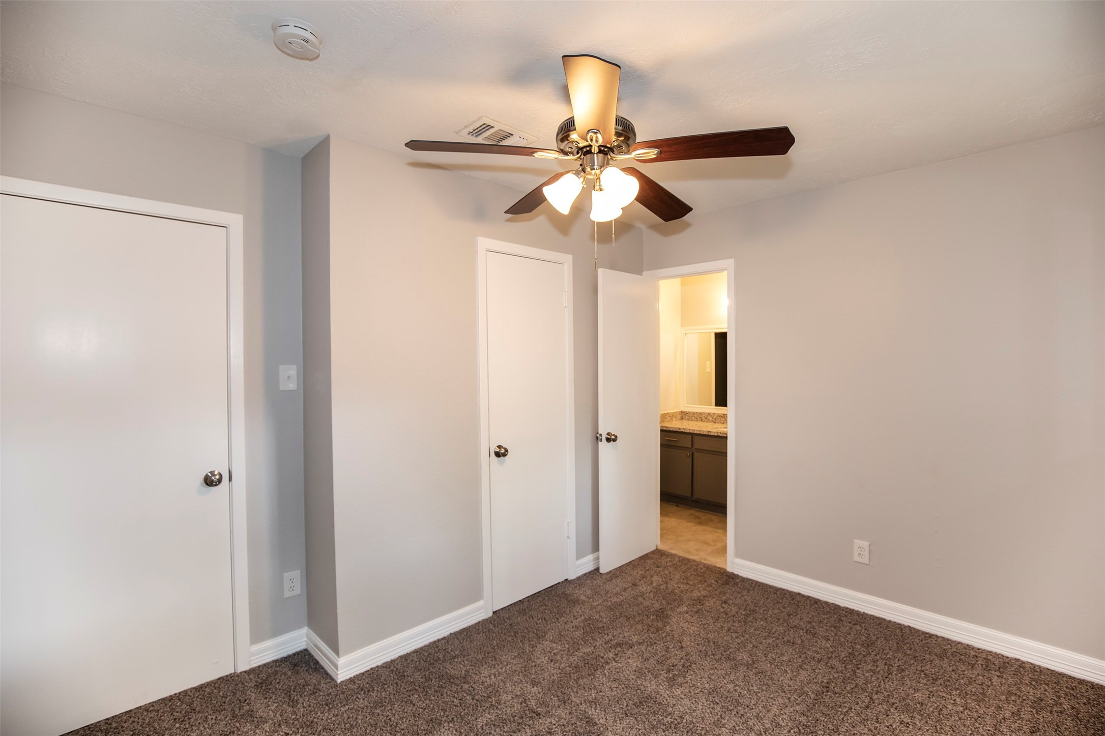 802 Wavecrest Lane Houston, TX 77062 - Photo 20 of 32 This bedroom has access to the guest bathroom.