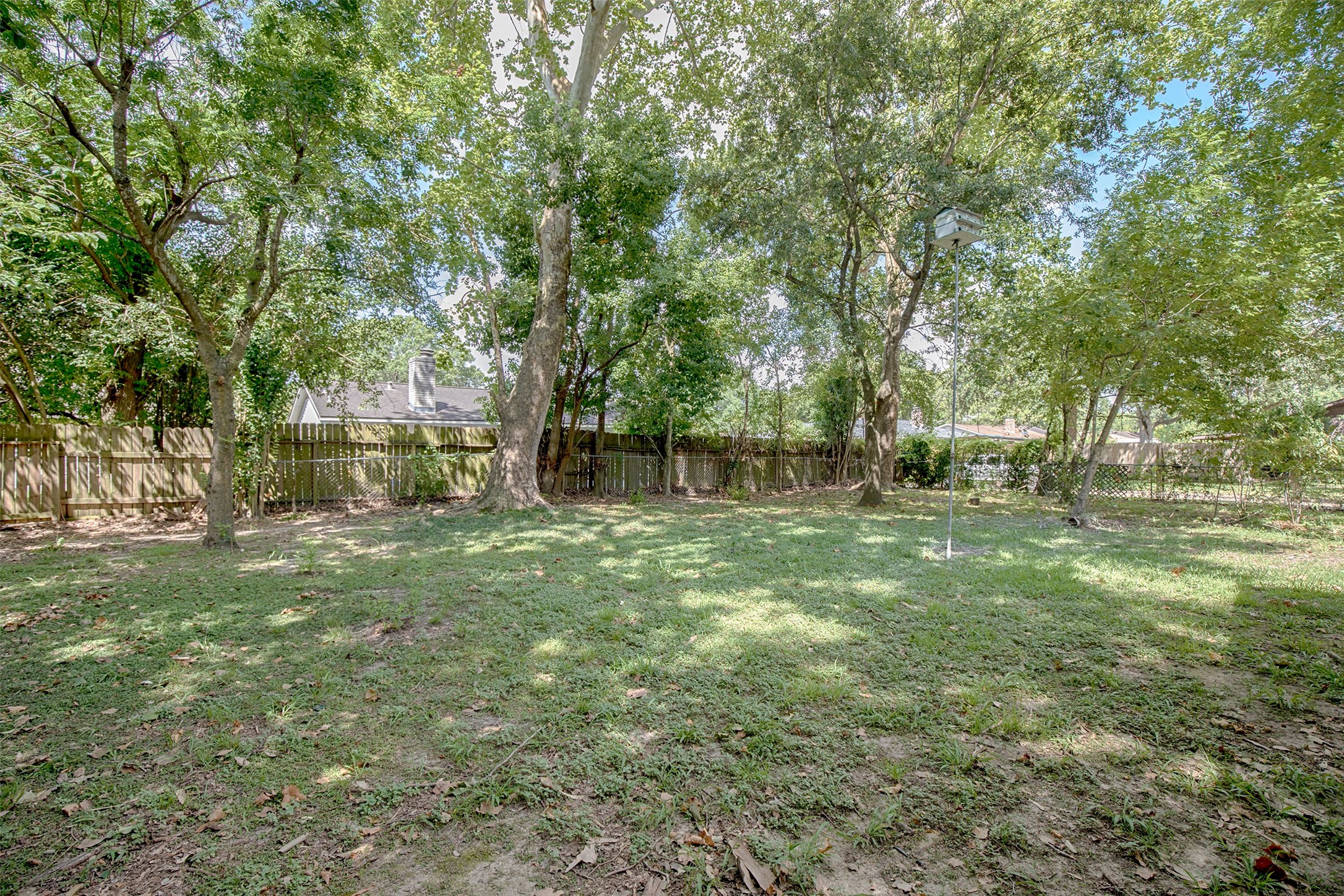 802 Wavecrest Lane Houston, TX 77062 - Photo 29 of 32 The huge backyard is a wonderful place for a cookout with family or friends.