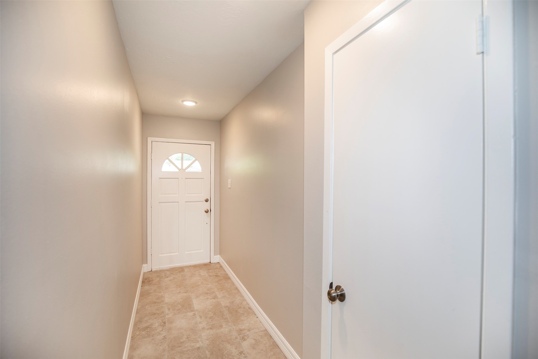 802 Wavecrest Lane Houston, TX 77062 - Photo 4 of 32 As you enter the home you are welcomed with marvelous tile flooring and neutral colors throughout.